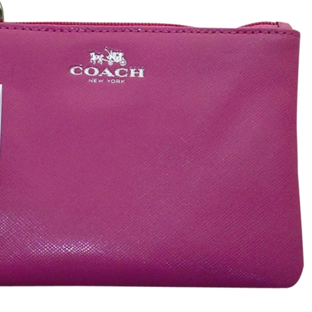 Like new! Coach Fuchsia large wrislet